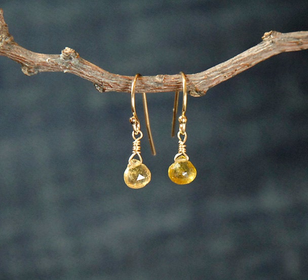 tiny faceted lemon quartz tear drop dangle earrings with gold ear wire.