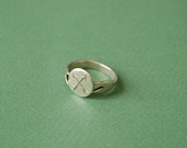 Silver crossed arrows signet ring