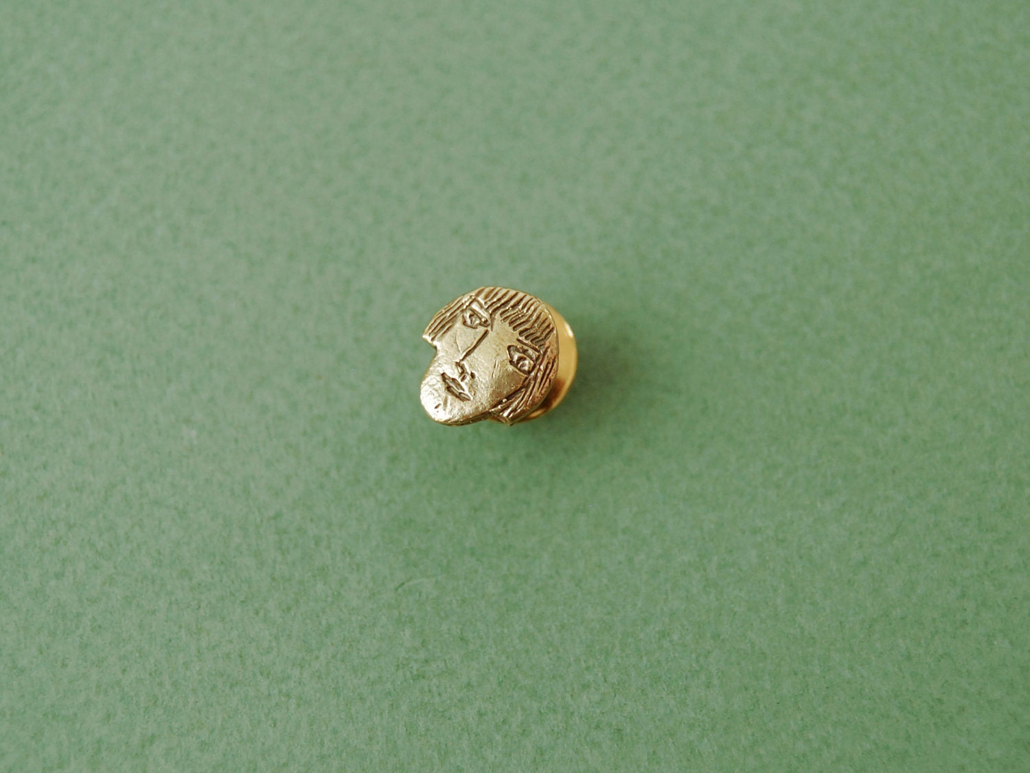Girl face lapel pin