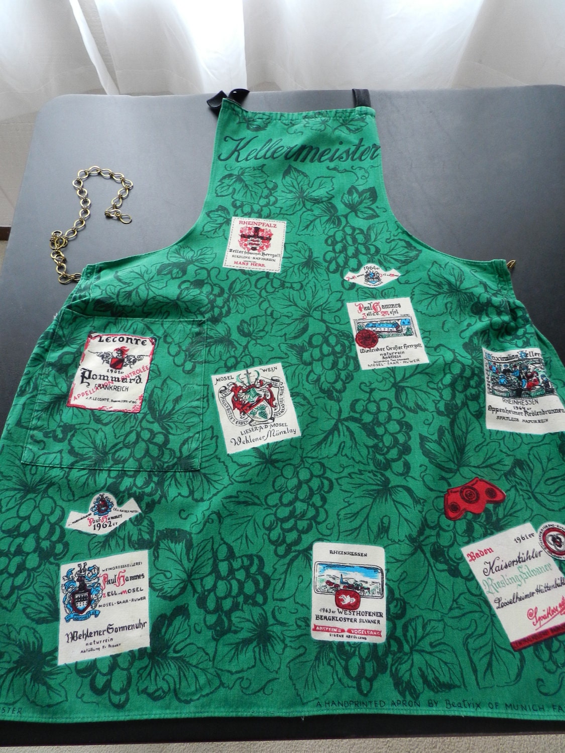 Vintage Handprinted German Wine Cellar Master Apron in green, white, red and black with unique metal chain tie