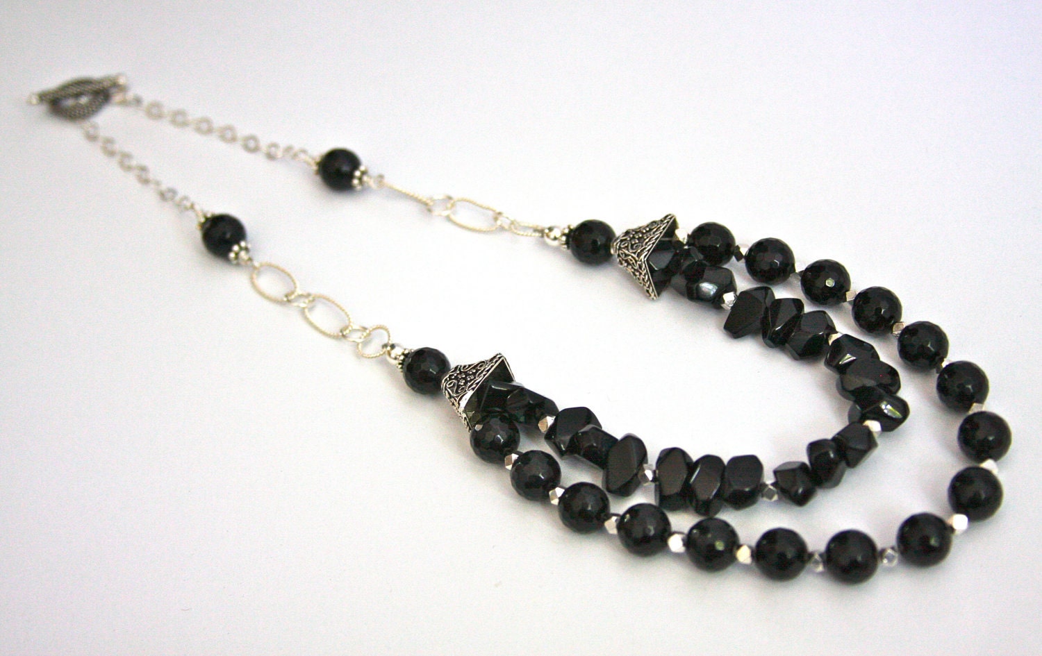 Double strand necklace made with onyx and sterling silver beads and chain