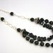 Double strand necklace made with onyx and sterling silver beads and chain