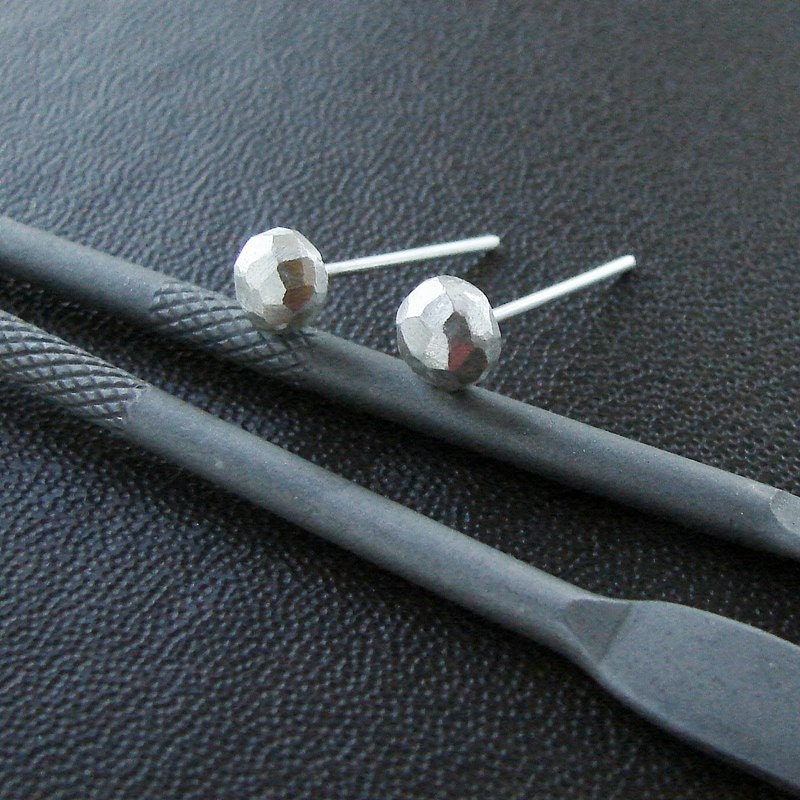 Sterling silver studs. Small faceted stud earrings.