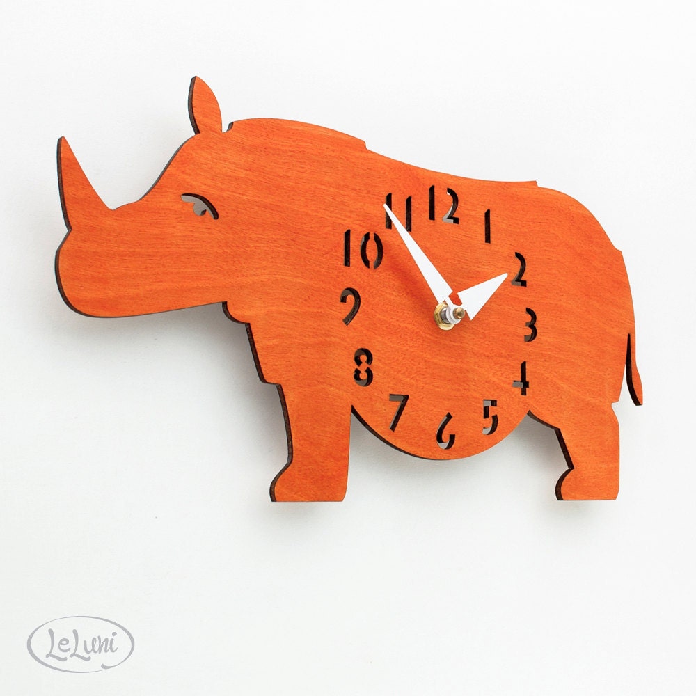 The "Rotund Rhino in Orange" designer wall mounted clock from LeLuni