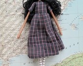 Judith, ooak small art doll with black curly hair and cotton checked dress.
