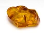 Amber transparent cabochon, cognac colored