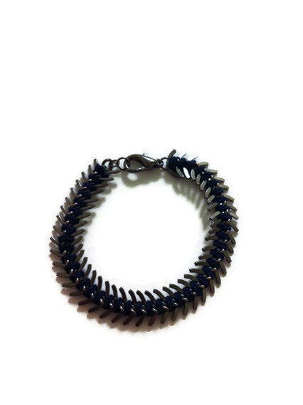 Fish tail wrapped in coloured thread bracelet