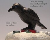 Crow box with heart inside.
