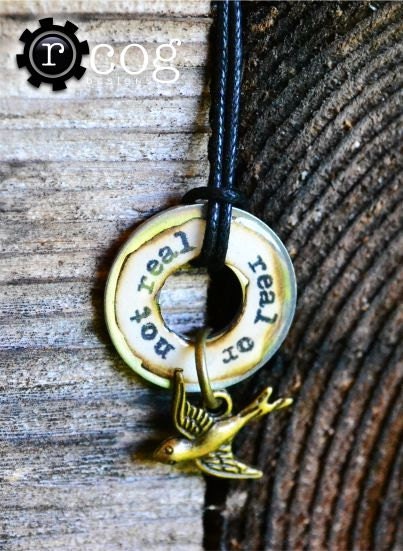 Hunger Games Necklace: "Real or Not Real" Katniss and Peetas Memorable Words Burned into a Token, Mockingjay Charm