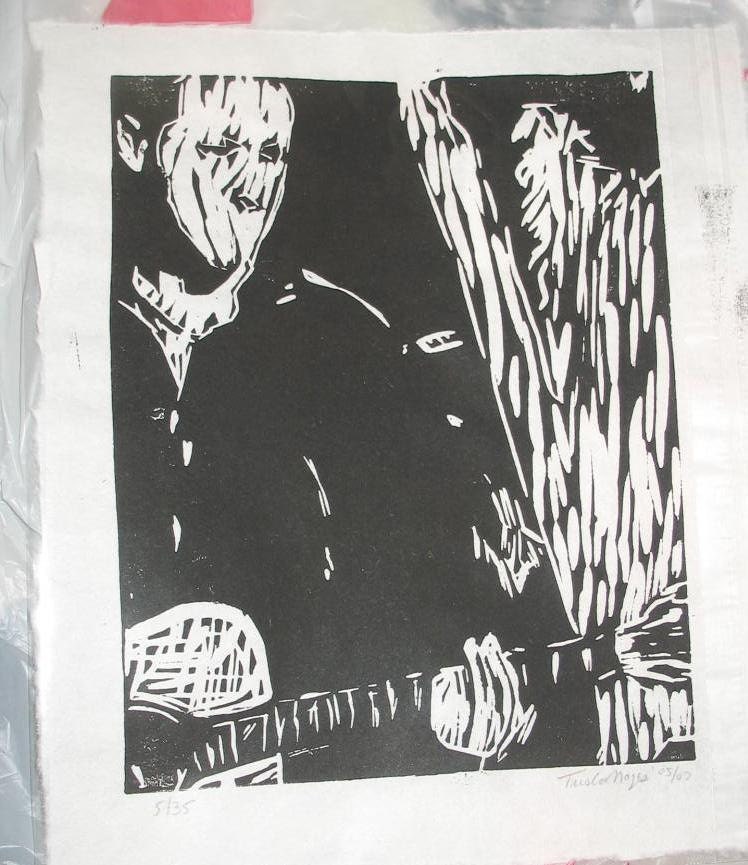 black and white linocut print guitar player