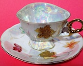 Lustreware Footed Cup and Saucer -- Butterflies and Gold Leaf Pattern