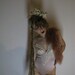 Cave girl cap. Leather fake fur, feathers and Vertebrae.