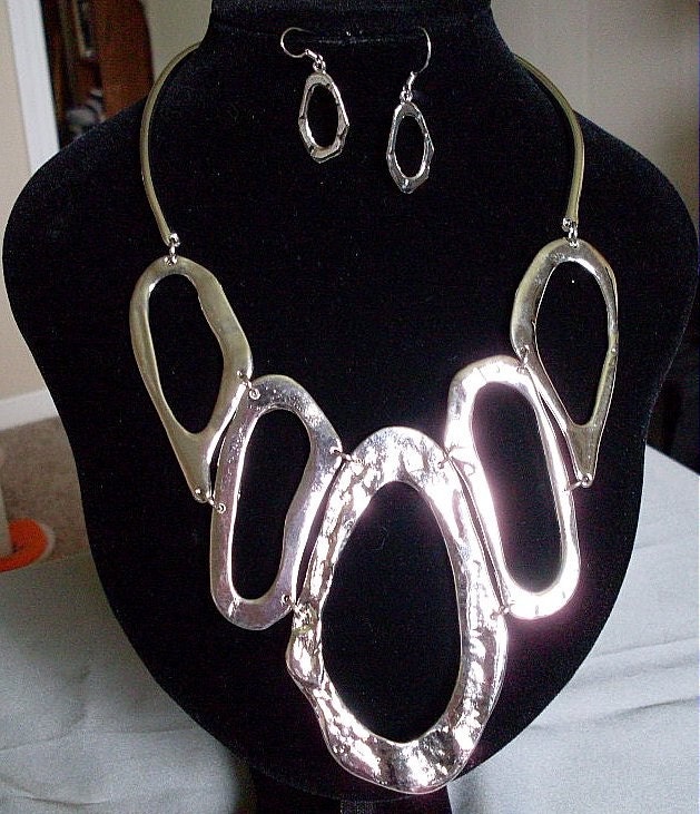 Statement set Inspired by Salvador Dali style choker, by shoptillyoudropnow on Etsy