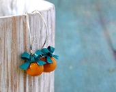 Pretty bows  in turquoise and honey yellow sterling silver hooks