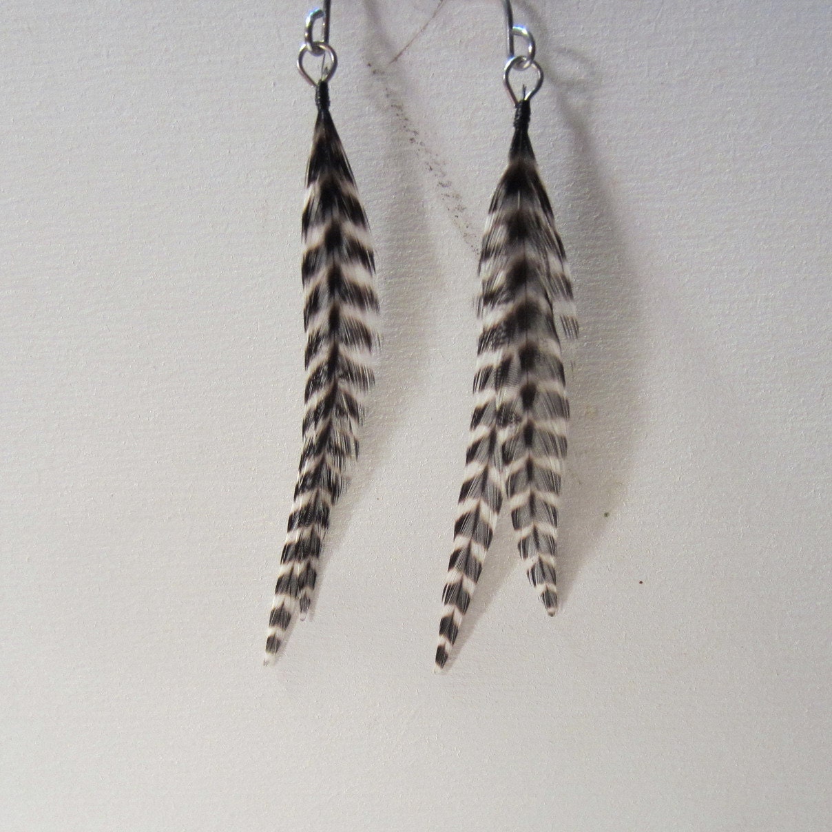 Tiger stripe dangler feather earrings grizzly