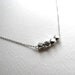 Silver geometric necklace with silver faceted beads, sterling plated, minimalist and modern