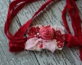 pink, coral and red pleated tieback