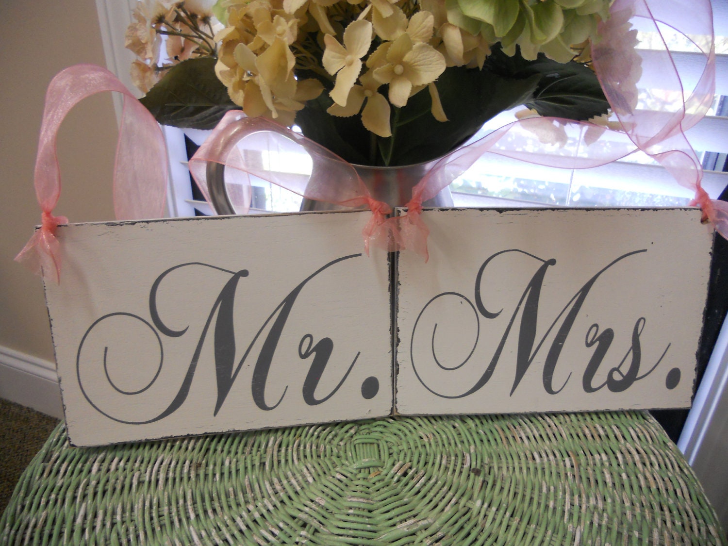 Mr and Mrs wedding signs with gray lettering. Distressed vintage style chair/photo signs..