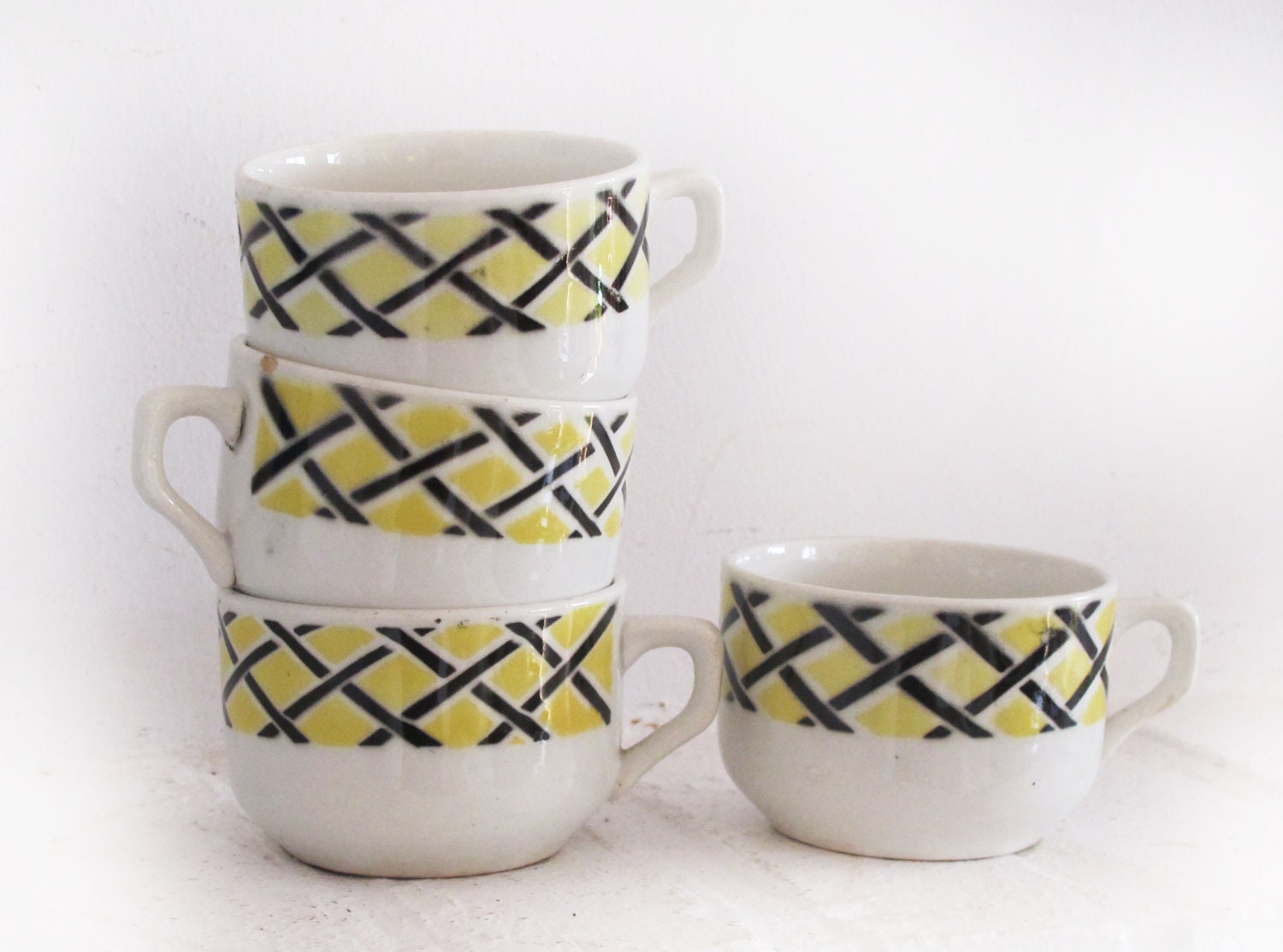 1950, set of 4 nice pretty cups French yellow and black geometrical pattern,white ceramic