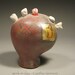 Menopausal Mind Ceramic Sculpture with Bones and Edv. Munch decals