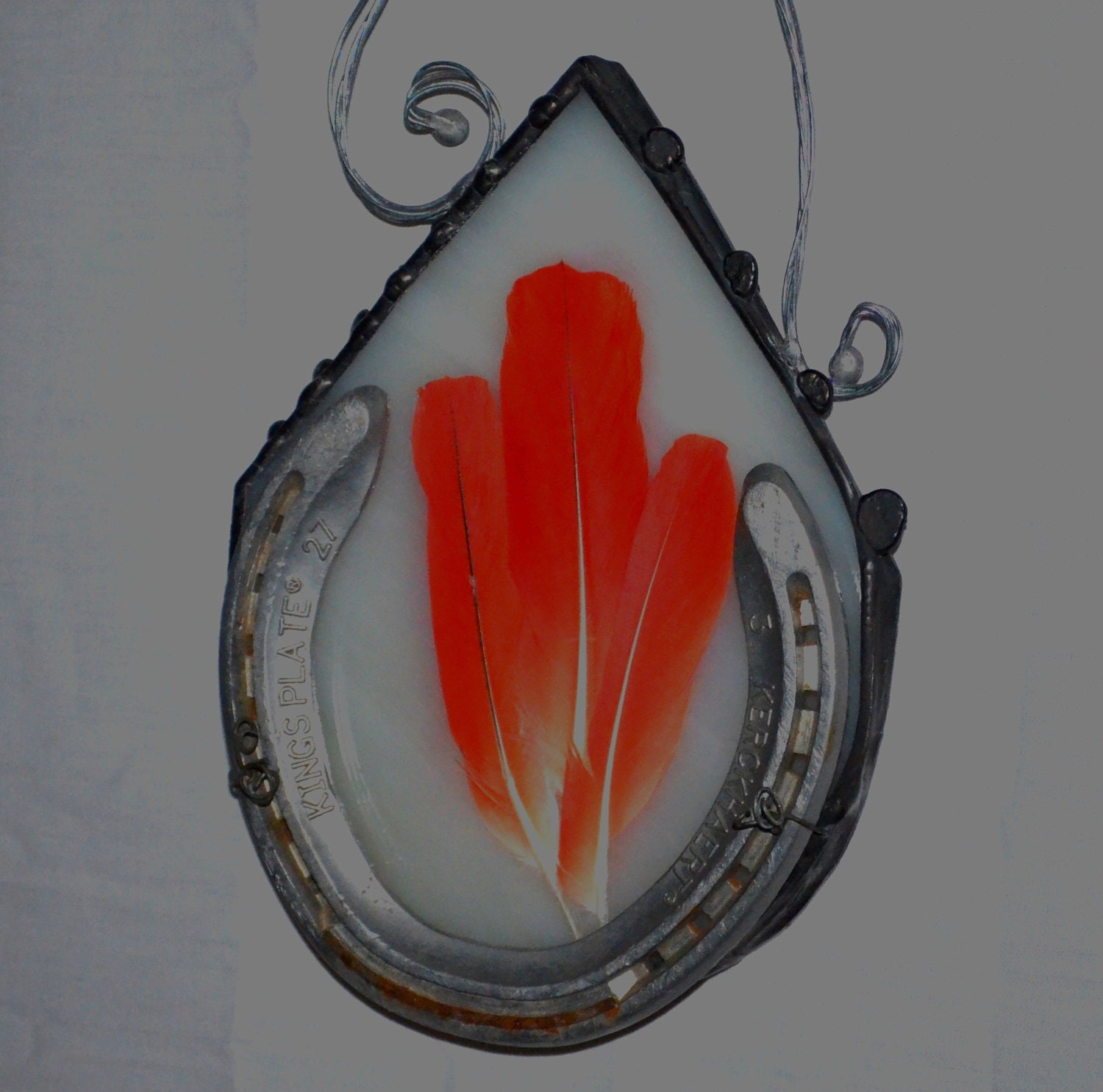Horseshoe Stained Glass Sun Catcher with African Grey Parrot Tail Feathers