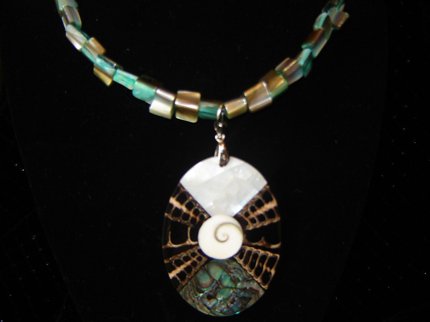 abalone, mother of pearl, mixed shell pendant on a turquoise bead necklace