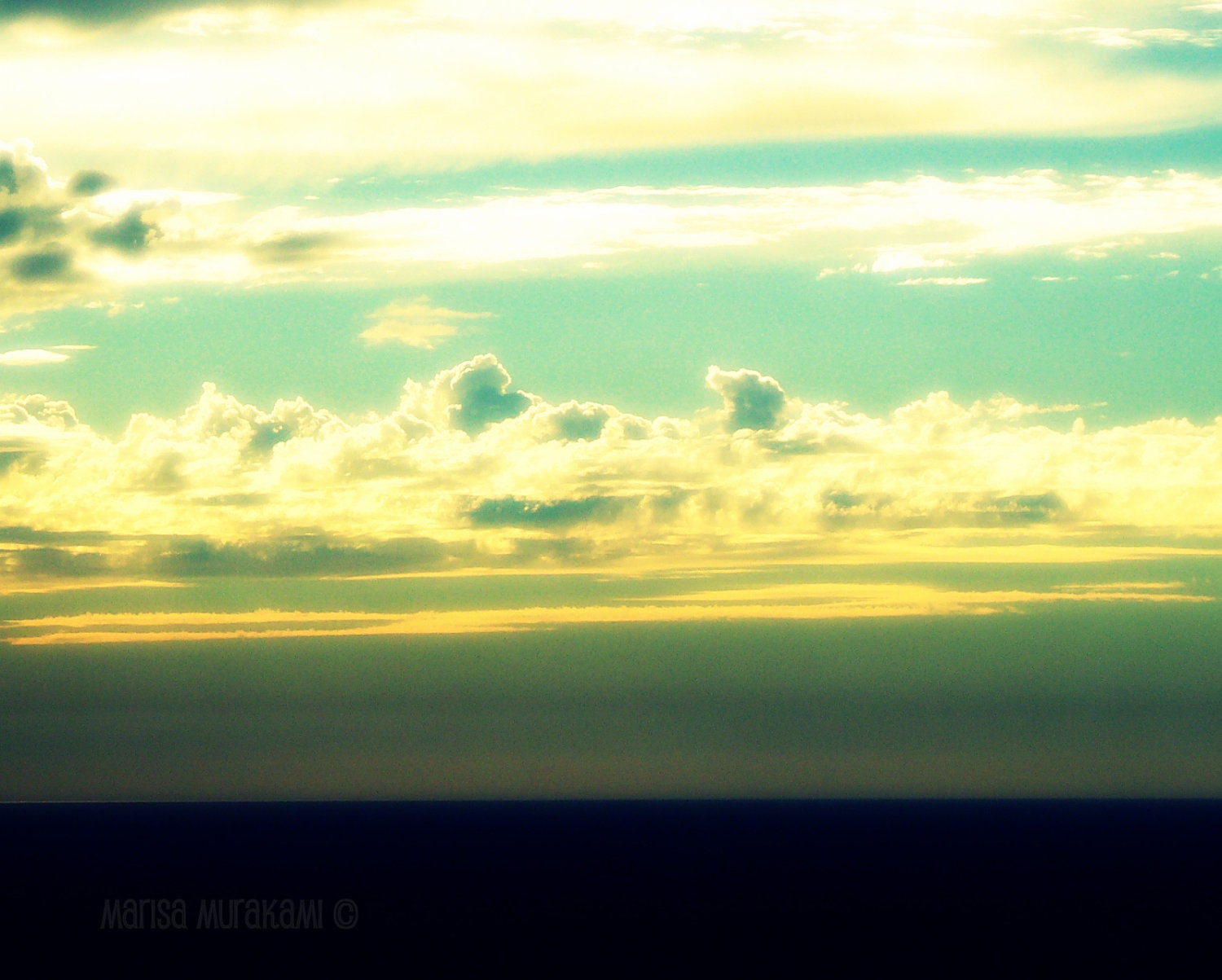 After the storm / clouds / ocean / blue / seascape / gold / yellow / aqua / beach / water