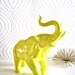 Ollie the fun glossy yellow elephant