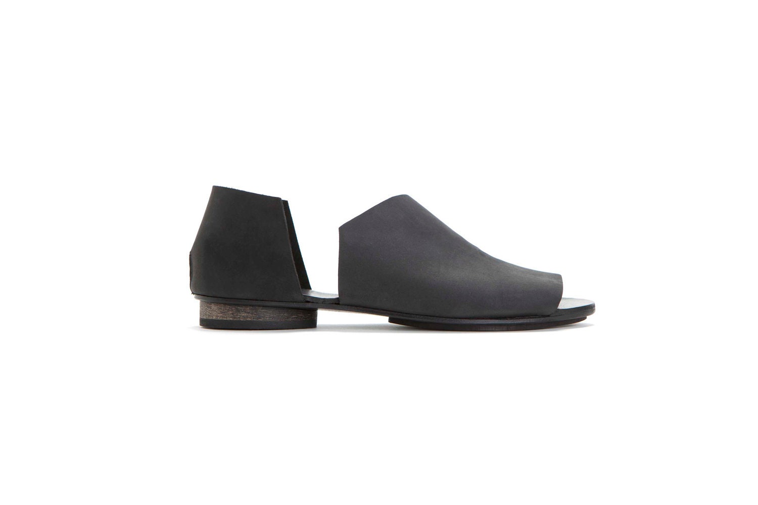 Black asymmetrical summer shoes