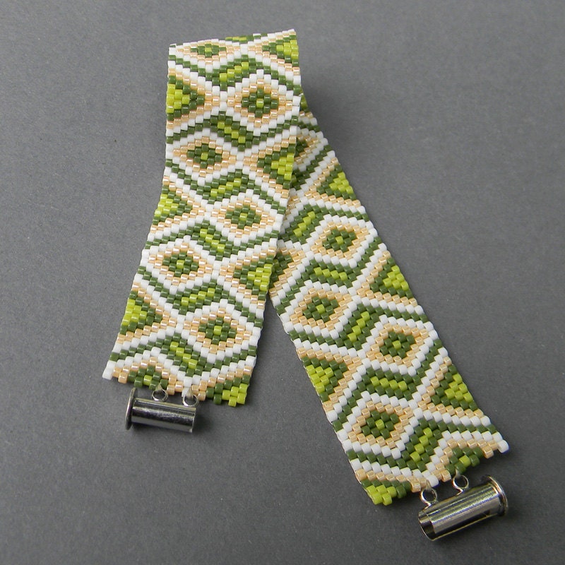 Peyote bracelet in green, cream and white tones
