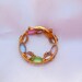 Multicolor Rhinestone Brooch with Gold Tone Circle Fab 60s Look