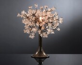 Table light. Natural transparent flowers.
