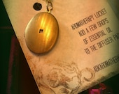 Oval Aromatherapy Locket for adding your own essential oil. Gold / Brass, with Extra Long Chain