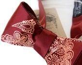 Coral and burgundy paisley bow tie. Mehndi design freestyle bowtie. Silkscreened necktie.