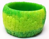 Opaque green and neon yellow cell pattern bangle