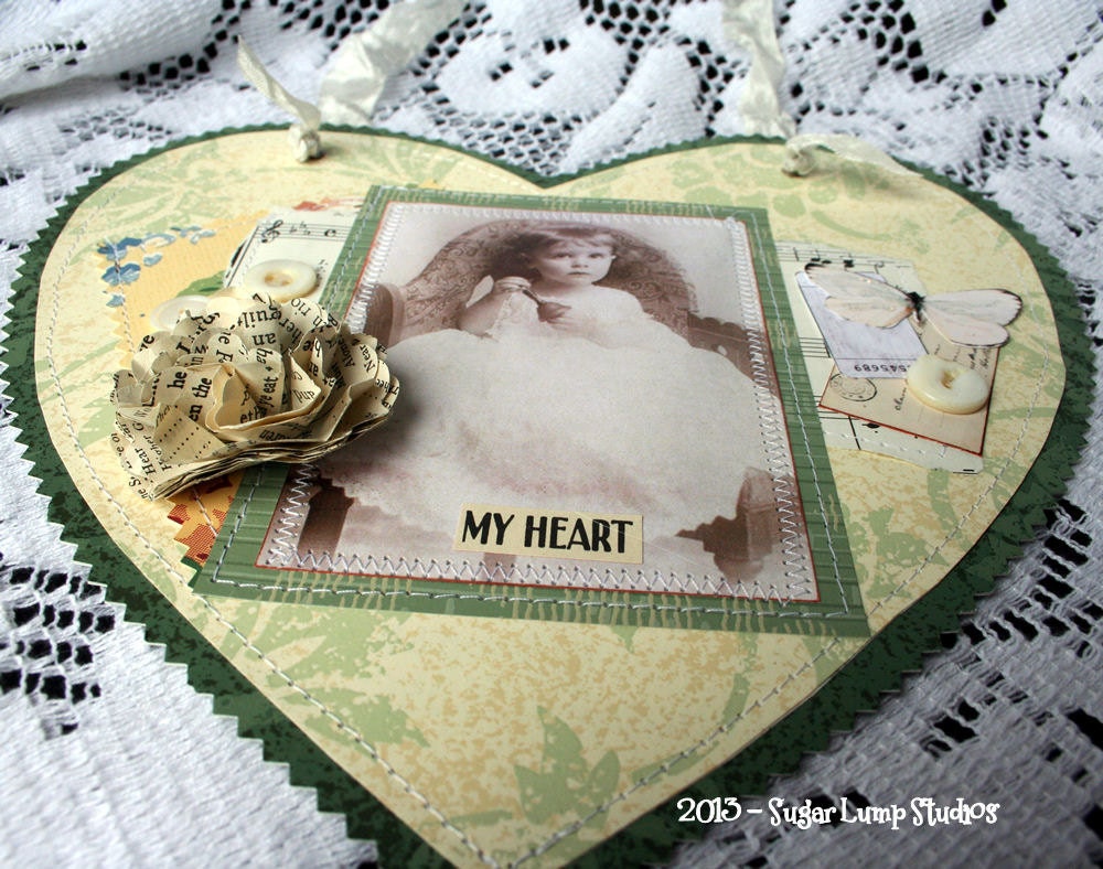 Altered WALLPAPER Heart with sewn collage image and vintage accents