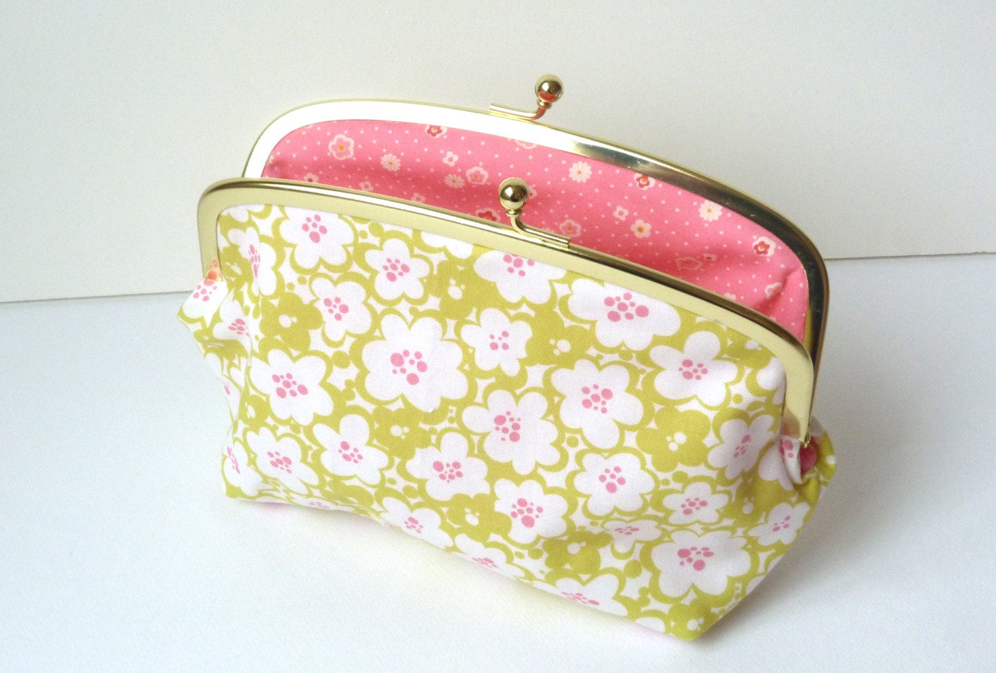 Green and Pink Graphic Floral Print Cosmetic Bag by cheekyleopard