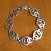 Vintage W. E. Richards Sterling Silver Interlocking Knot Bracelet
