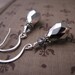 Silver Metallic drop earrings with vintage Swarovski comet argent crystals
