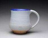 pottery mug, coffee cup, teacup with orange shino and white ash glazes