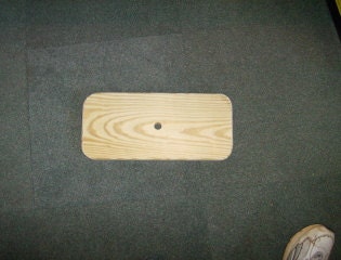 Just a Watchamacallit swing seat 15 inches in long x  1/12 inches thick