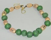 Necklace of bold, chunky glass and brass beads