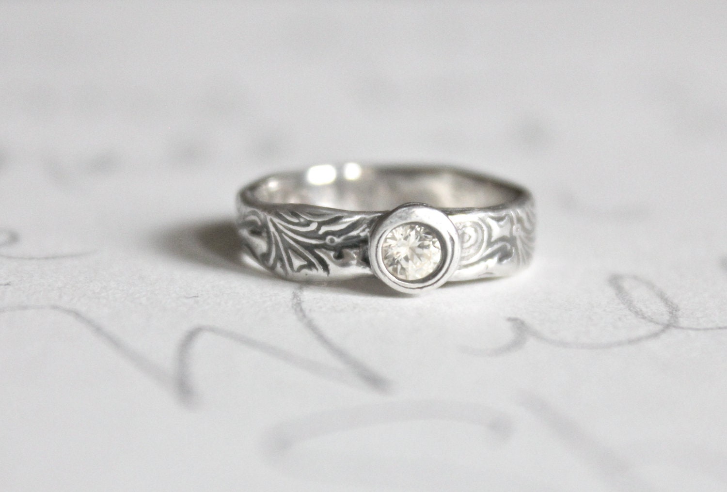 white sapphire scroll engagement ring . recycled silver engagement ring . engraved message . ready to ship size 5 by peacesofindigo