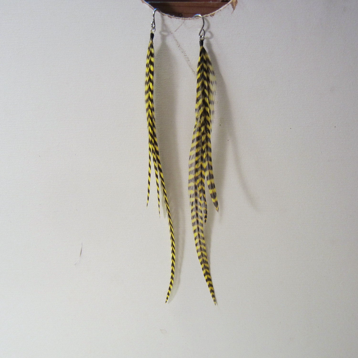 Long thin Feather Earrings Yellow grizzly