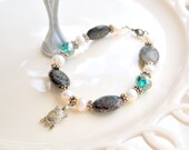 Stone and  emerald green Swarovski crystal turtle bracelet.