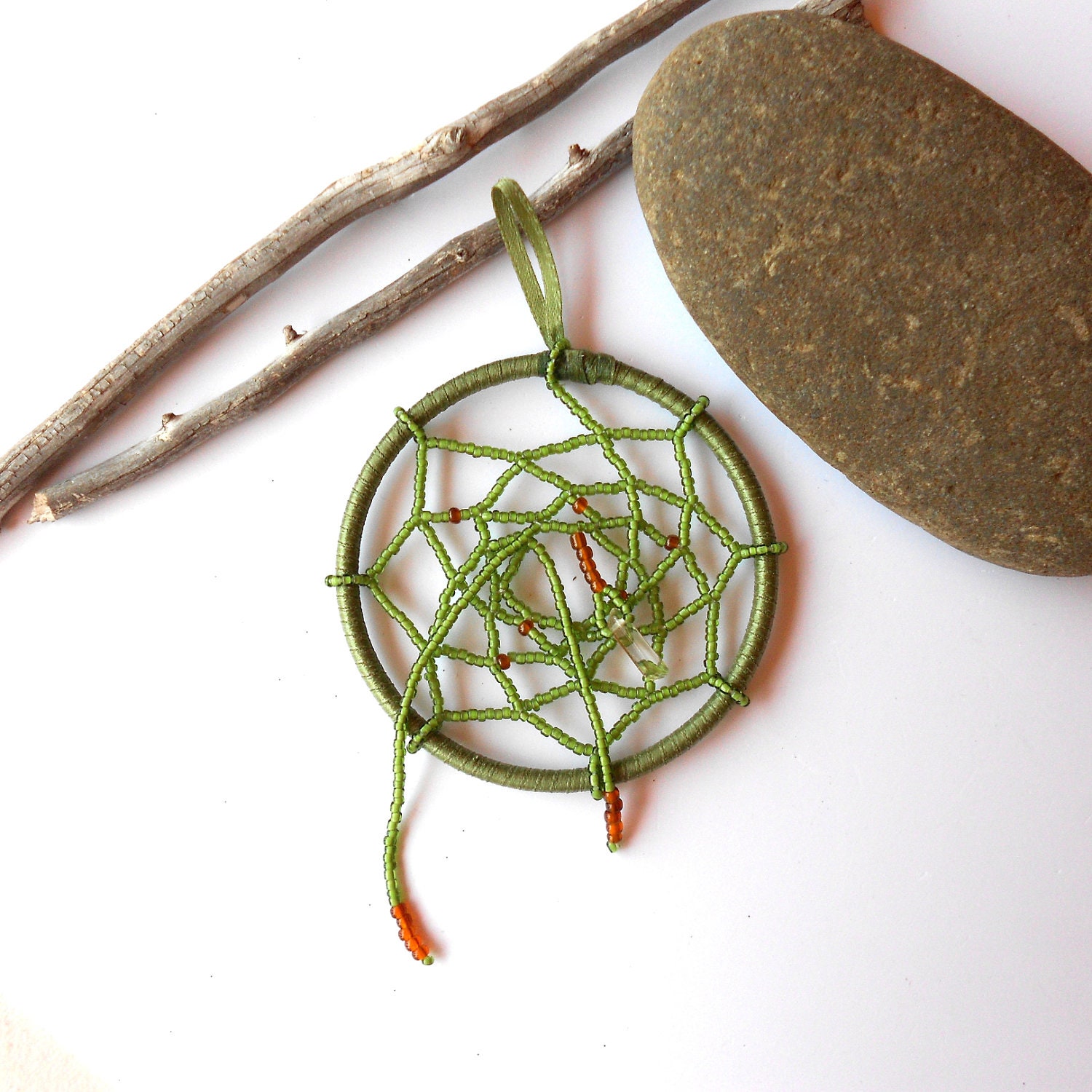 Dreamcatcher beaded green and brown with a tumbled quartz
