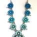 Ombre Squash Blossom Necklace- Hand Cast Sterling Silver and Hand Dyed Swarovski Cabochon Crystal (Blues)
