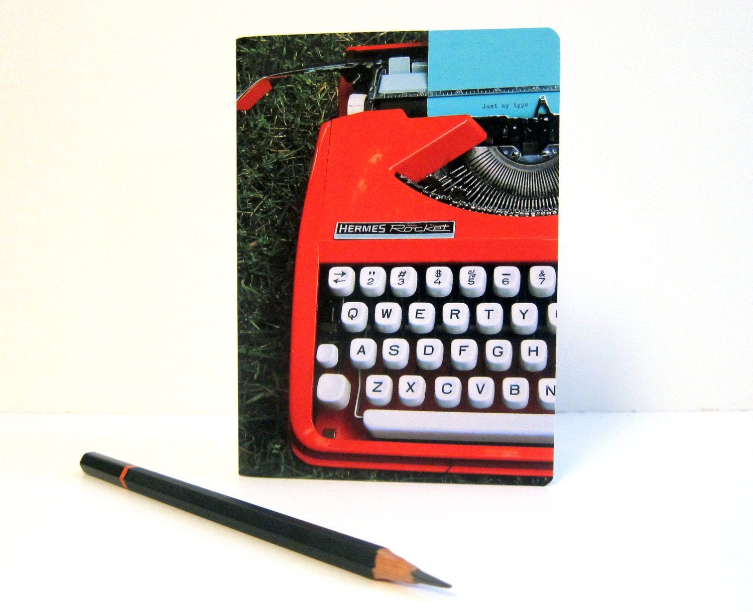 Vintage typewriter notebook jotter orange Hermes Rocket photograph cover A6 blank plain paper journal sketchbook Typescale stationery