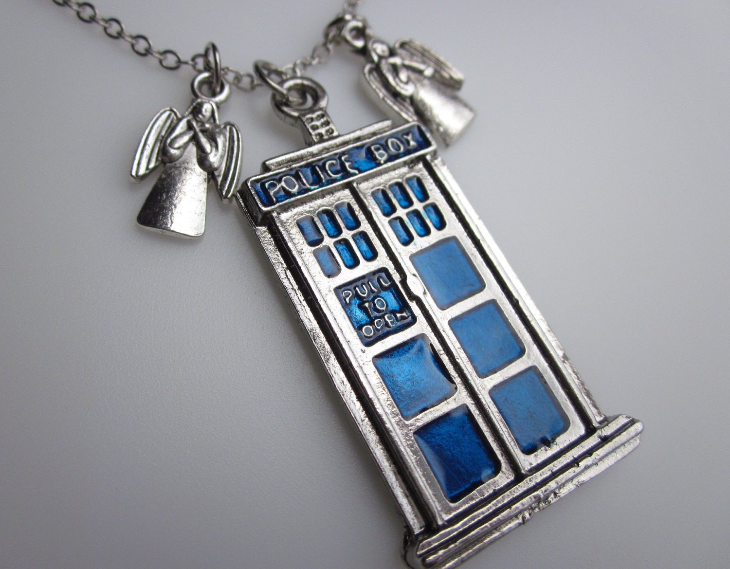 DONT BLINK. Police Box Necklace with Weeping Angels
