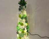 Beer bottle light with green frog topper